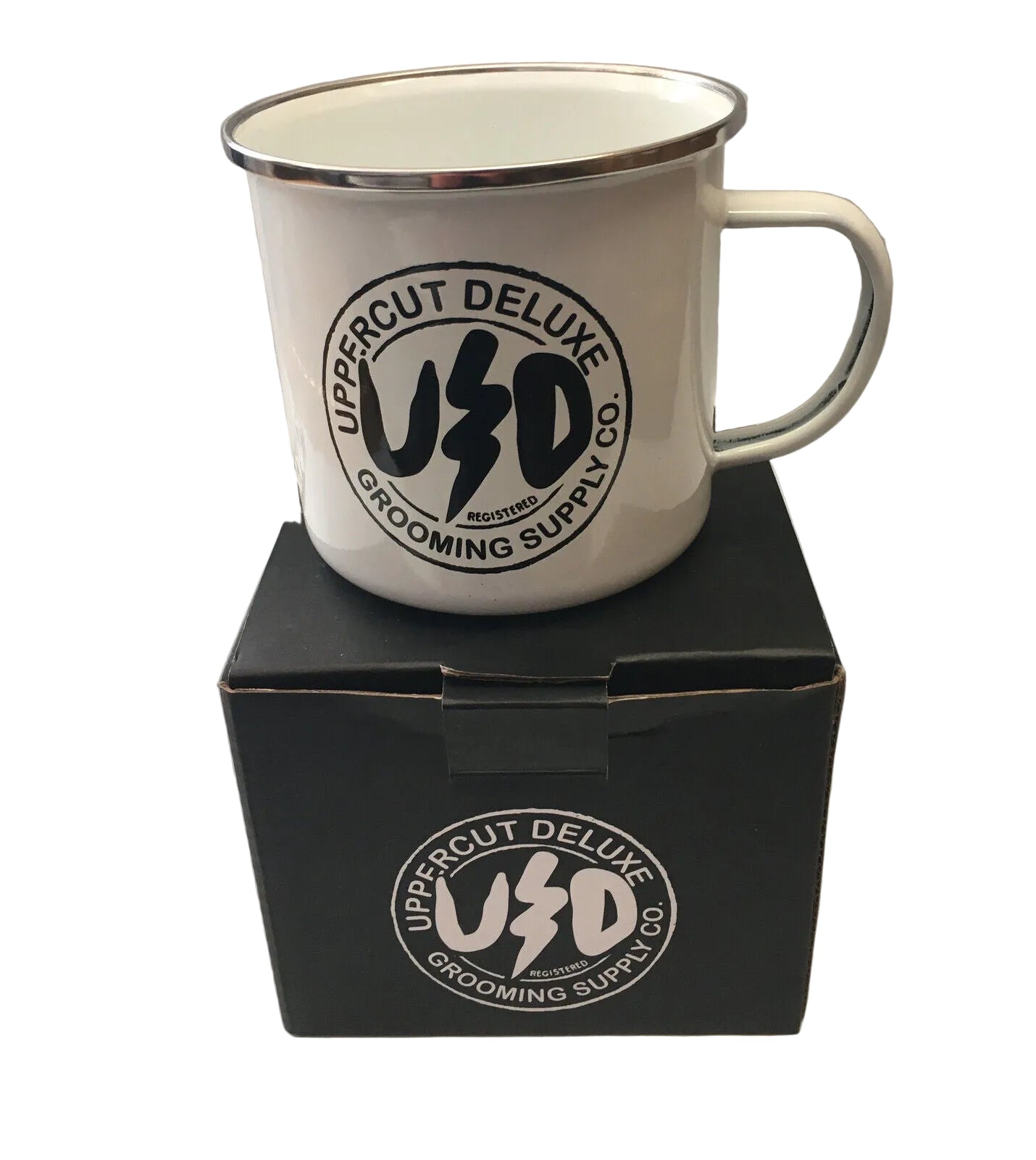 White mug with Uppercut Deluxe logo on a black box