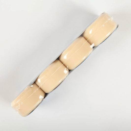 Four Spitfire Formula Four conical full wheels wrapped in clear plastic, arranged diagonally on a plain white background.