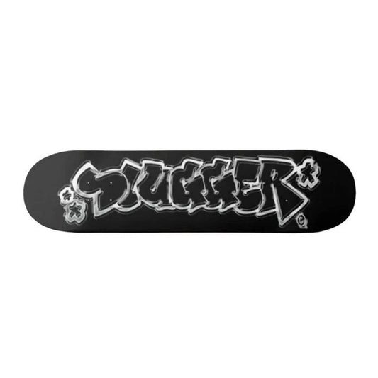 A black skateboard deck featuring a large white graffiti-style graphic of the word 'slugger' outlined in black, shown against a plain white background.
