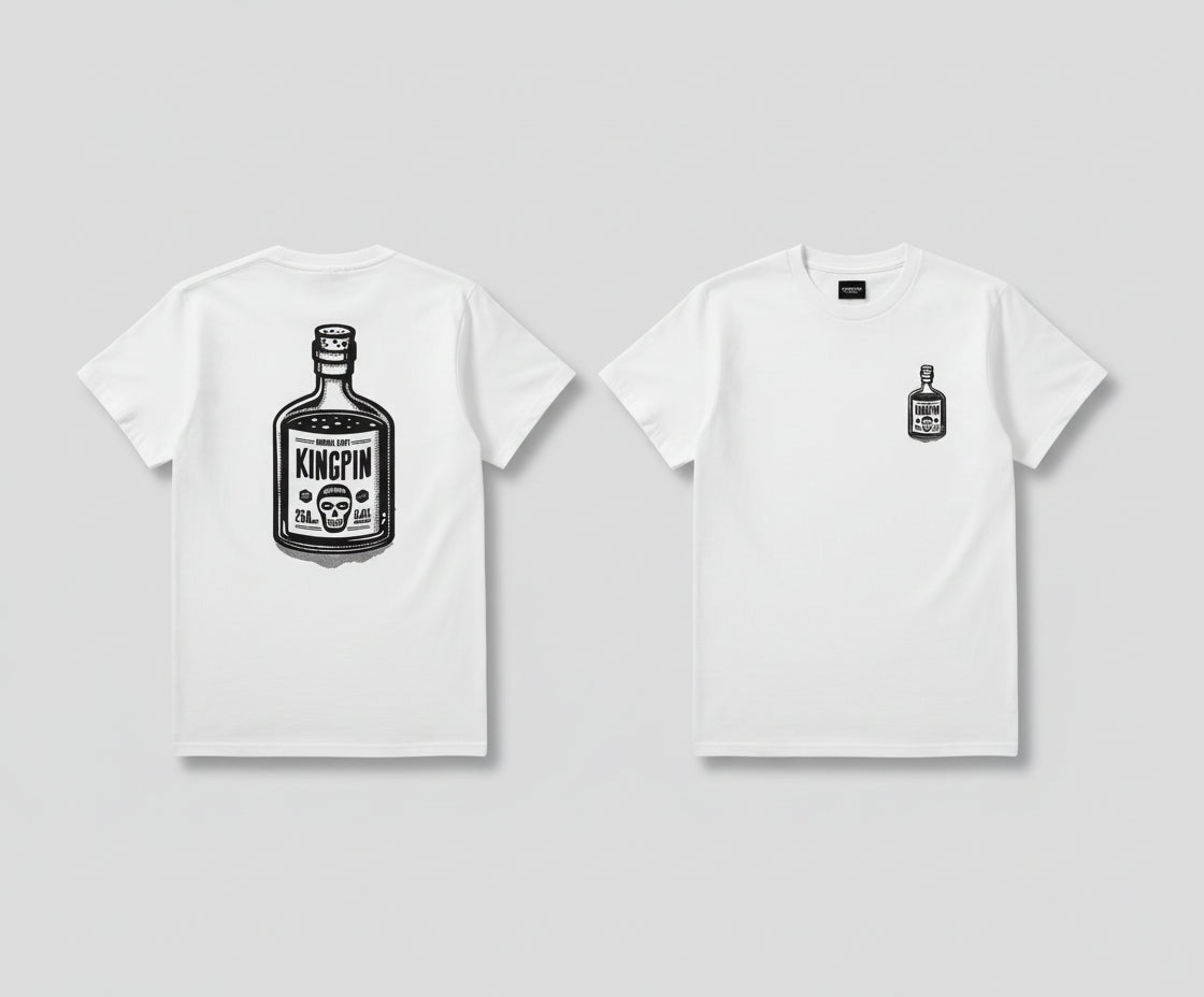 Two white t-shirts with left chest prints of a bottle and a skull, and the brand 'KINGPIN' printed on the front. One t-shirt is displayed on a hanger and the other is laid out flat on a wooden surface.