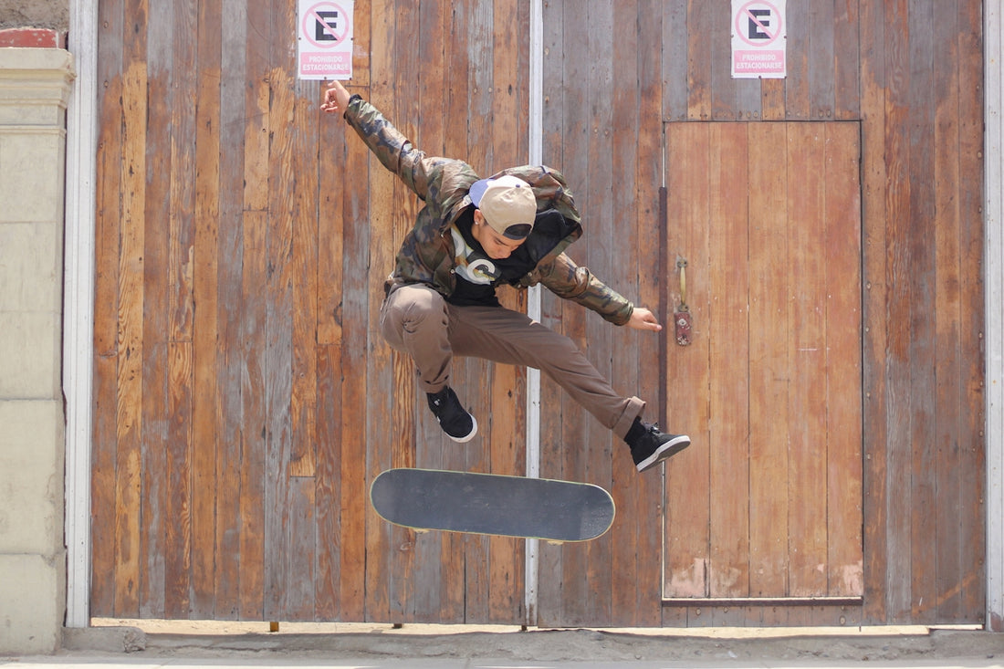 man playing skateboard trick