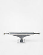A single silver metal skateboard truck with mounting hardware, photographed against a seamless white background.