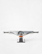 A single skateboard truck with a silver metal chrome finish, featuring a small orange accent ring, set against a plain white background.