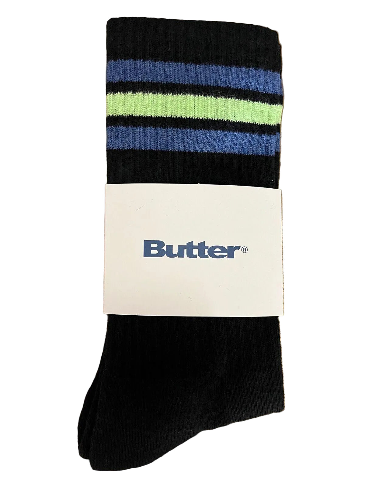 Black sock with colorful stripes on a 'Butter' branded box on a wooden surface