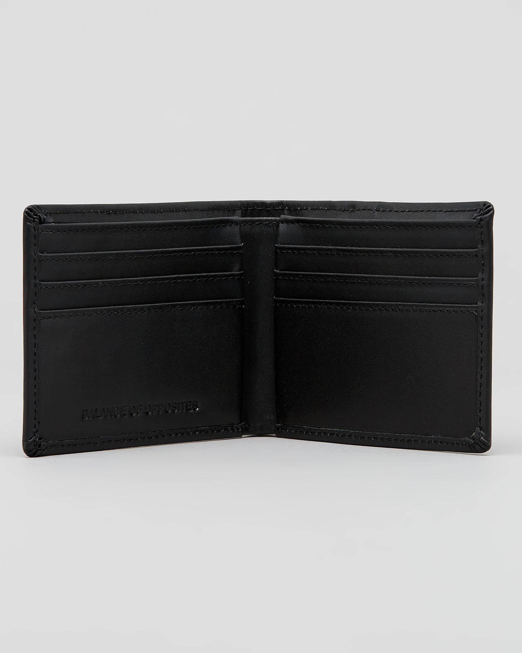An open black leather bi-fold wallet with multiple card slots and a debossed logo on the lower left interior, shown against a light gray background. RVCA