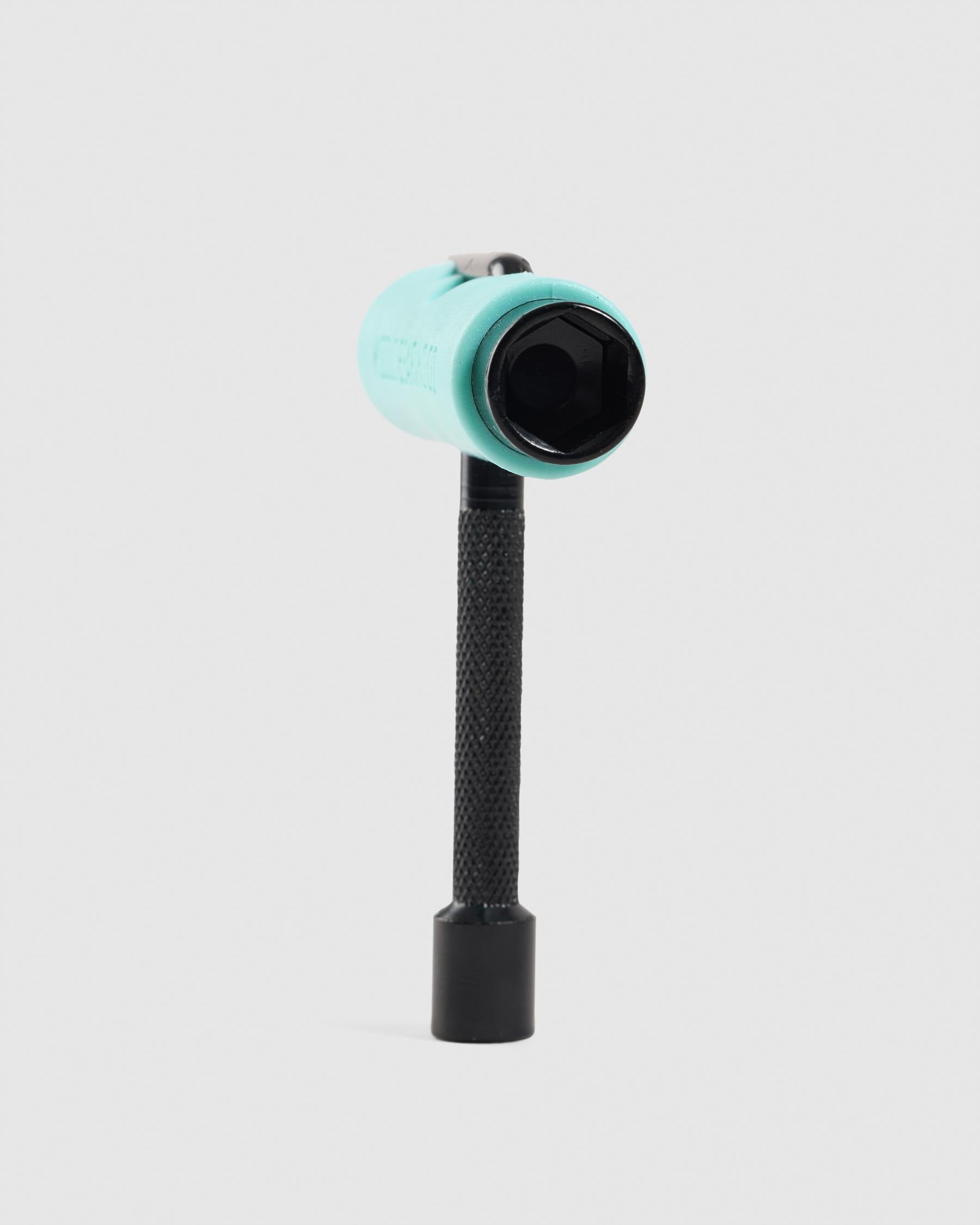 A teal and black socket wrench with a textured black handle, shown on a light gray background.