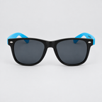 Black sunglasses with blue temple arms and dark gray lenses, photographed against a light gray background.