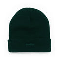A dark forest green knit beanie with a folded cuff, featuring the word 'modus.' embroidered in matching green on the front cuff, set against a plain white background.