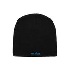 A black knit beanie hat with the word 'modus.' embroidered in bright blue on the front cuff, shown against a plain white background.