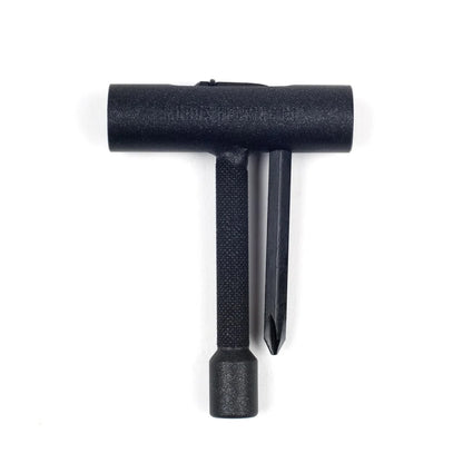 A black plastic T-shaped tool with a textured handle and a flat blade, shown on a plain white background.
