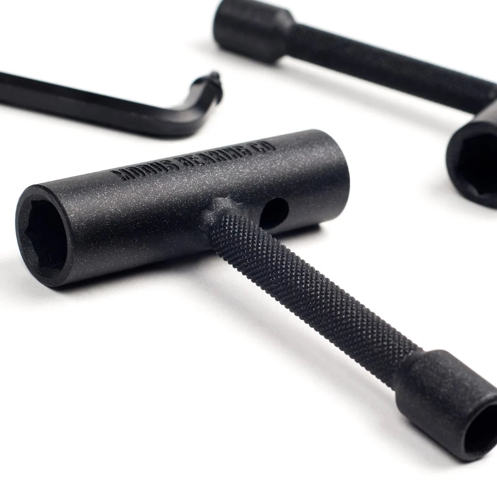 Close-up of black hex keys on a white background