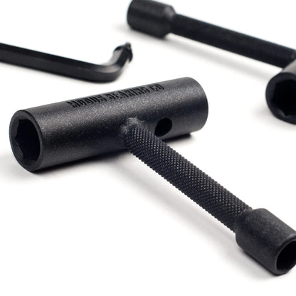 Close-up of black hex keys on a white background