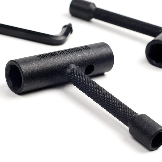 Close-up of black hex keys on a white background