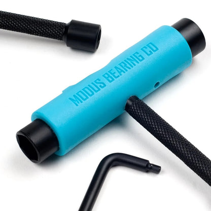 Blue tool with black ends and 'Modus Bearing Co' branding on a white background