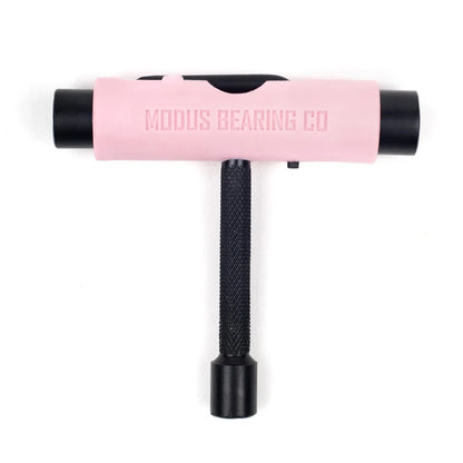 Pink and black t-shaped tool with 'Modus Bearing Co' branding on a white background