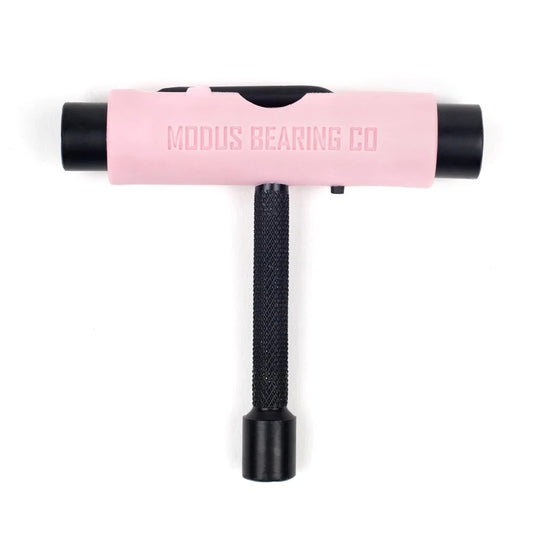 Pink and black t-shaped tool with 'Modus Bearing Co' branding on a white background
