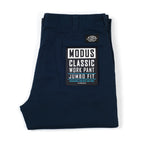 A folded pair of dark navy blue work pants with a prominent black and white 'Modus Classic Work Pant Jumbo Fit' label on the back pocket, set against a plain white background.