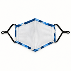A reusable cloth face mask with a blue and white abstract patterned border, a white center panel, and black elastic ear loops, shown flat against a white background.