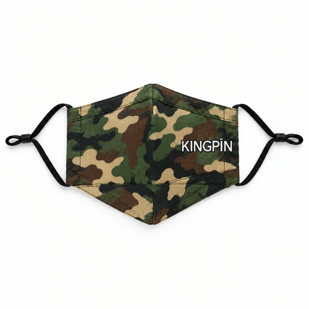A camouflage face mask with black ear loops and the brand name 'KINGPIN' printed in white on the front, shown against a plain white background.