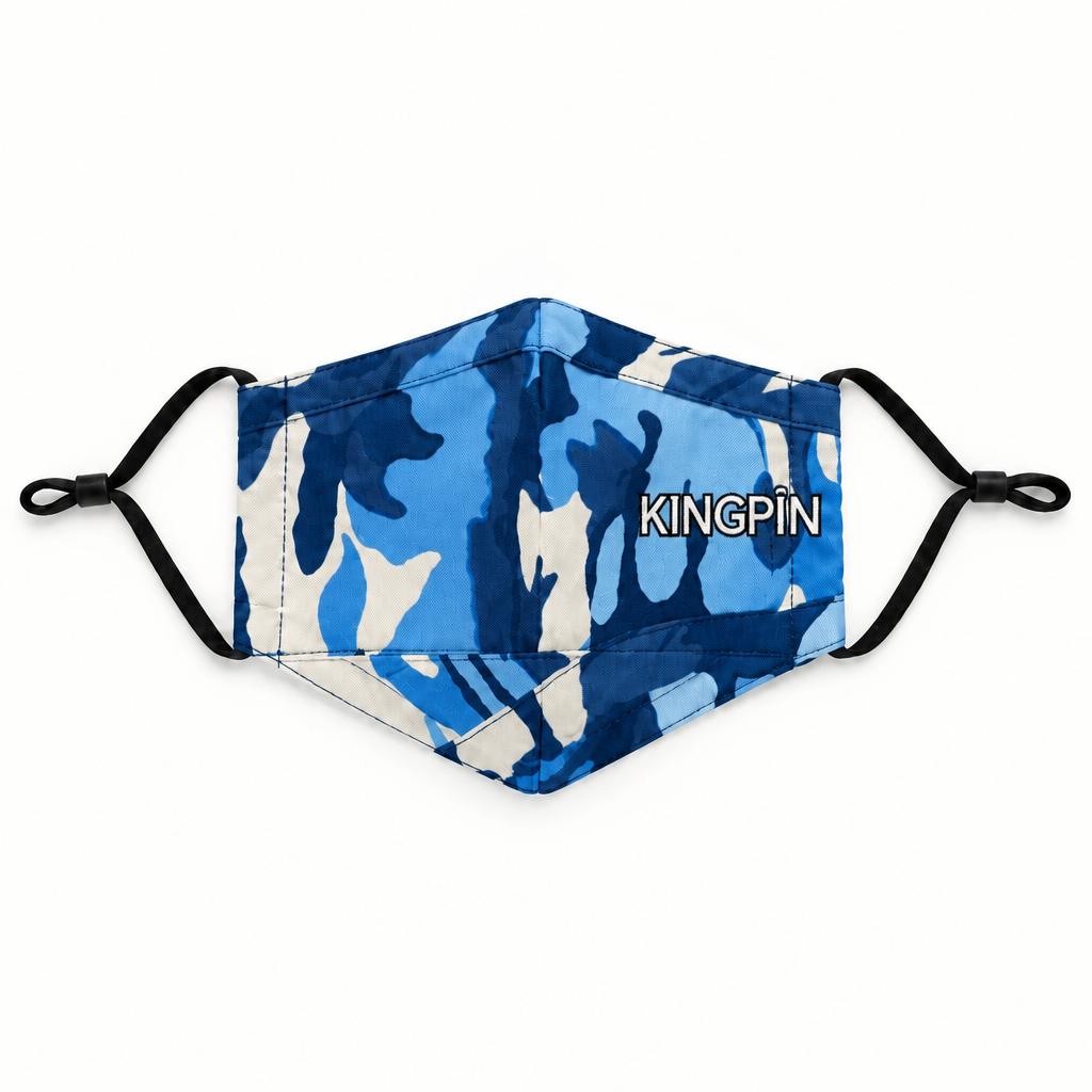 A blue and white camouflage face mask with black elastic ear loops and the brand name 'KINGPIN' printed in white on the front, shown against a plain white background.
