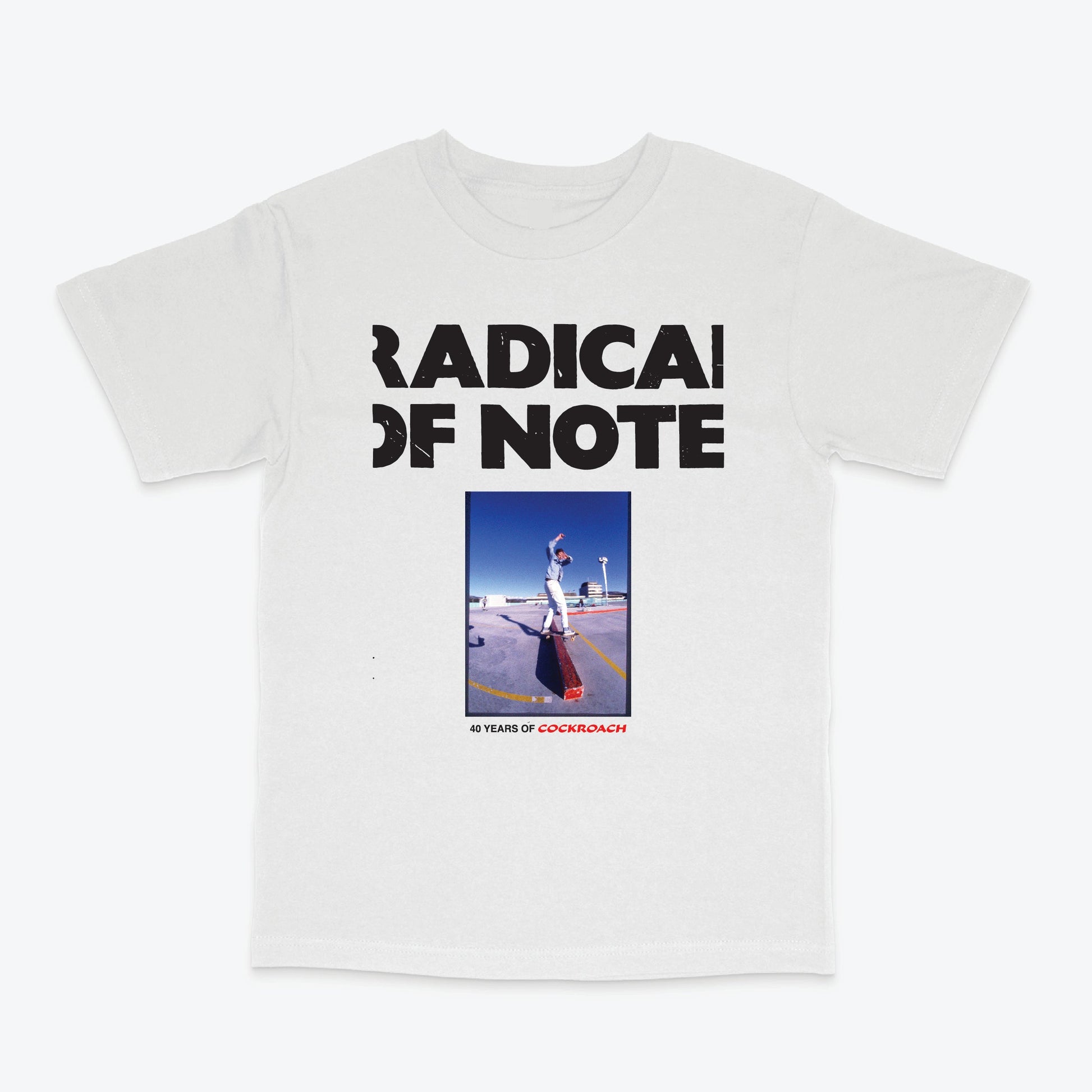 A white short-sleeve crewneck t-shirt featuring a black graphic print that reads 'RADICAL OF NOTE' above a square photo of a person skateboarding on a ramp, with '40 YEARS OF CORKINBOYZ' printed below.