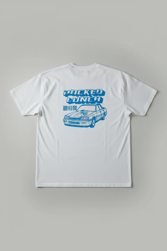 Person wearing a white t-shirt with blue graphics and text on the back.
