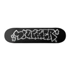 A black skateboard deck featuring a large white graffiti-style graphic of the word 'slugger' outlined in black, shown against a plain white background.