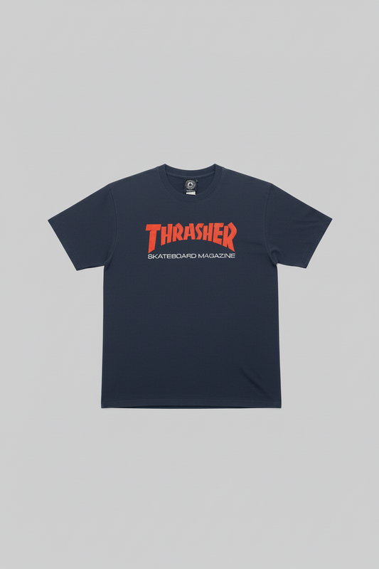 A navy short-sleeve crewneck t-shirt featuring the red and white Thrasher Skateboard Magazine logo printed across the chest, displayed flat against a solid gray background.