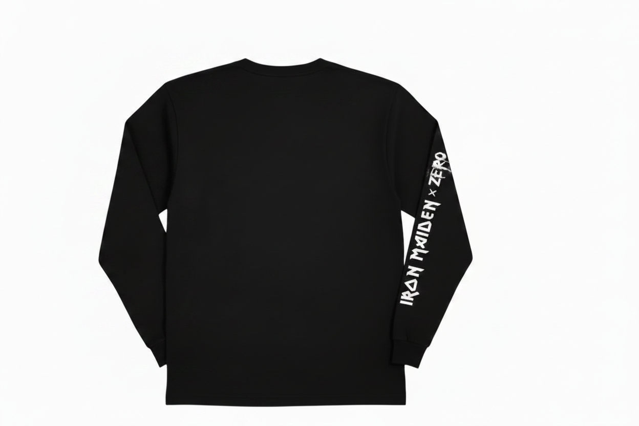 A black long-sleeve t-shirt with 'IRON MAIDEN x ZERO' printed in a white distressed font across the upper back, with the text continuing down the right sleeve, shown against a plain white background.